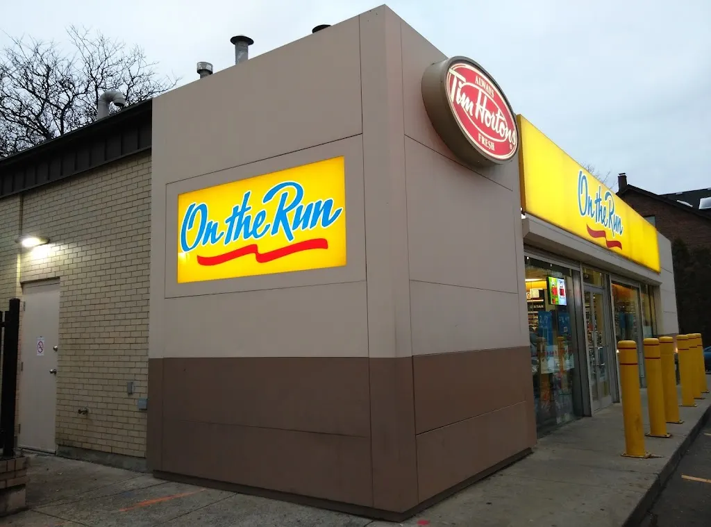Tim Hortons storefront and interior at 581 Parliament St, Toronto, ON