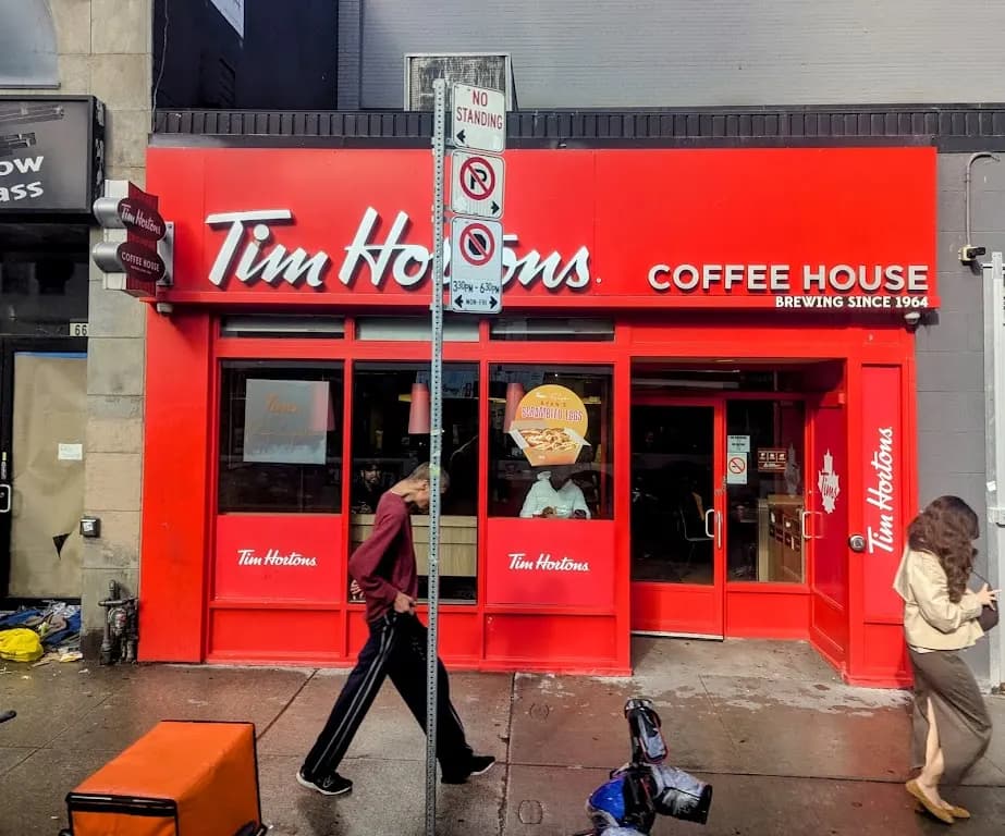 Tim Hortons storefront and interior at 663 Yonge St, Toronto, ON