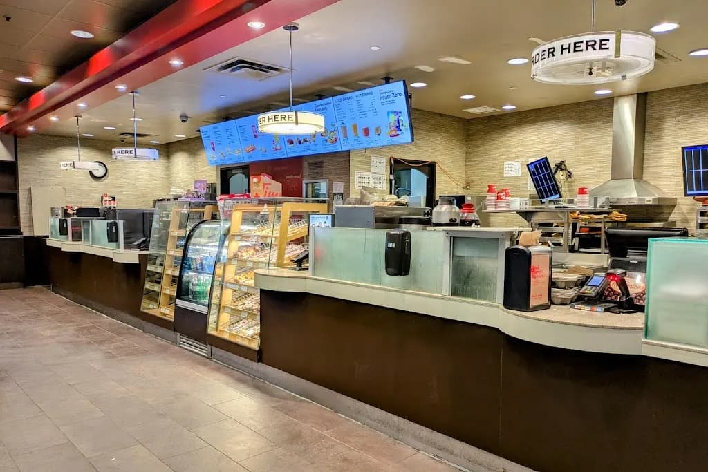 Tim Hortons storefront and interior at 700 University Ave, Toronto, ON