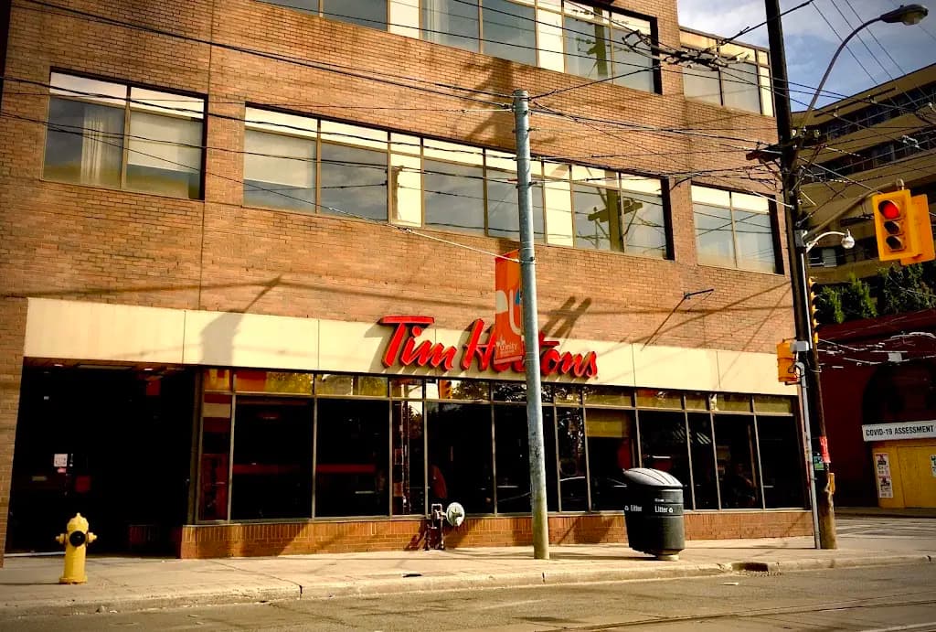 Tim Hortons storefront and interior at 750 Dundas St West, Toronto, ON