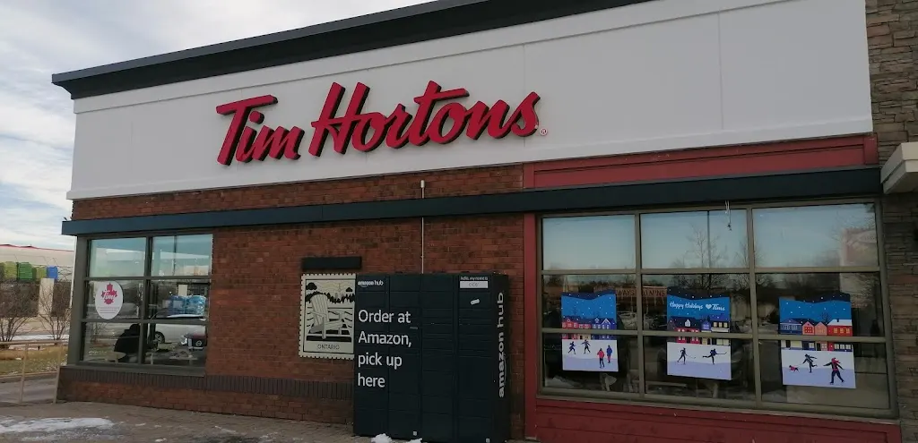 Tim Hortons storefront and interior at 815 Caledonia Rd, Toronto, ON