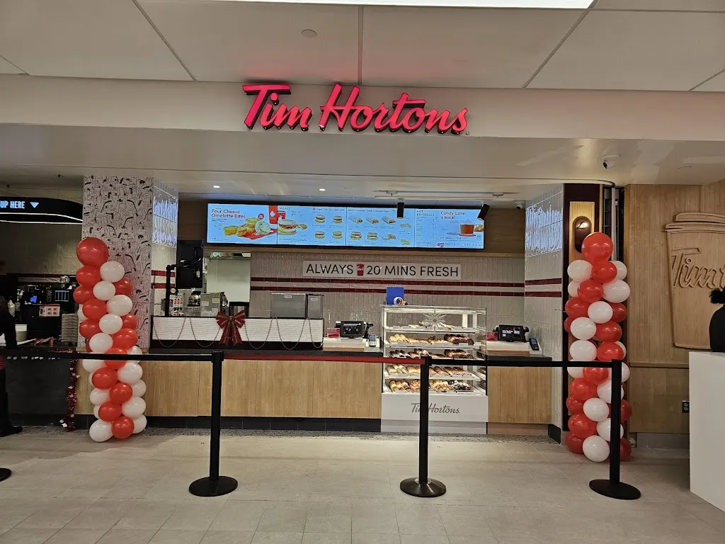 Tim Hortons storefront and interior at 825 - Coxwell Ave, Toronto, ON
