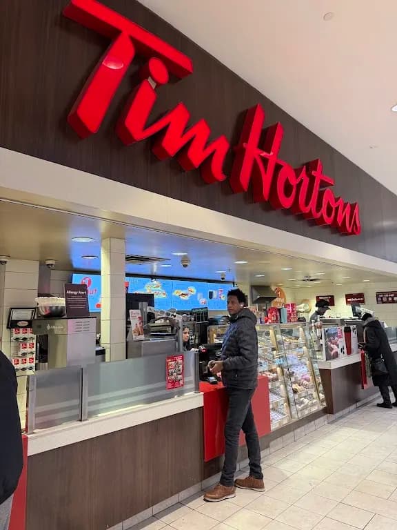 Tim Hortons storefront and interior at 900 Dufferin St., Toronto, ON