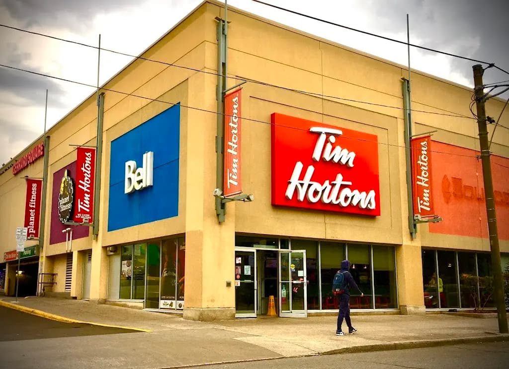 Tim Hortons storefront and interior at 1000 Gerrard St. East, Toronto, ON
