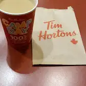 Tim Hortons storefront and interior at 1000 Gerrard St. East, Toronto, ON