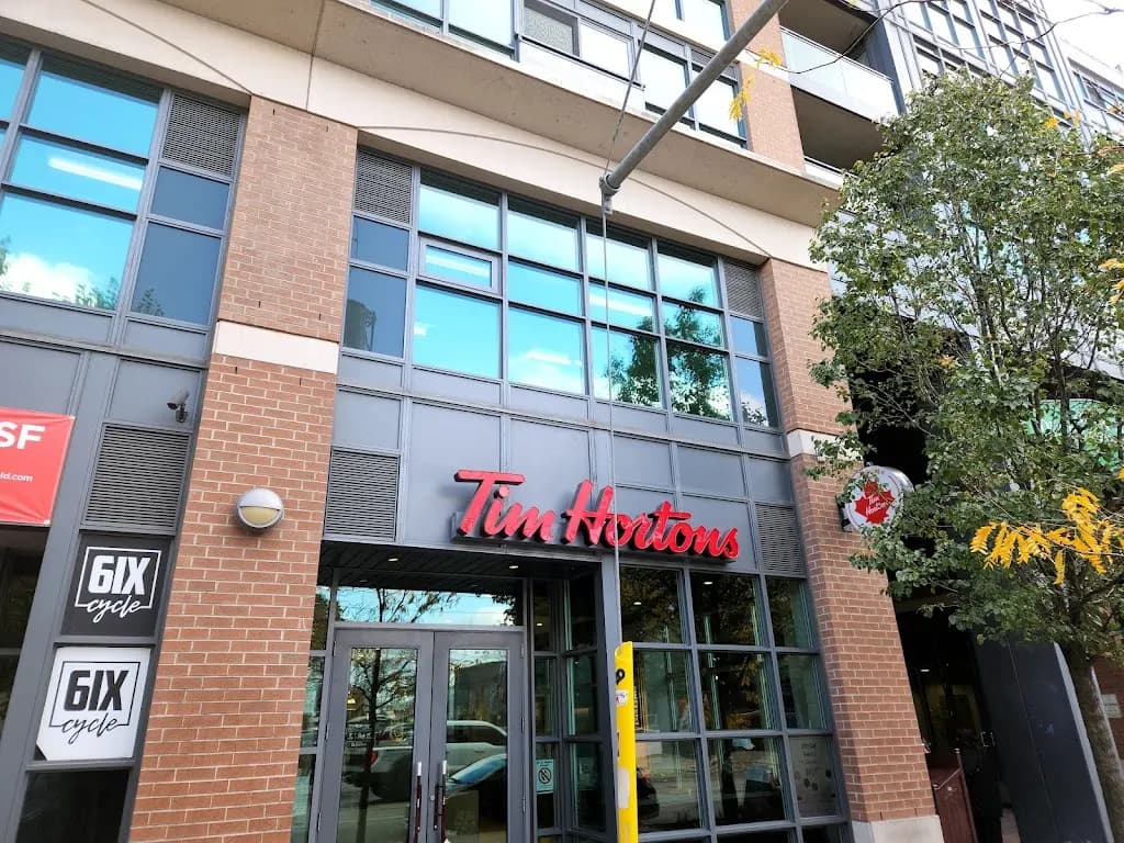 Tim Hortons storefront and interior at 1167 Queen St W, Toronto, ON