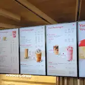 Tim Hortons storefront and interior at 1170 Bay St, Toronto, ON