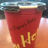 Tim Hortons storefront and interior at 1269 College St, Toronto, ON