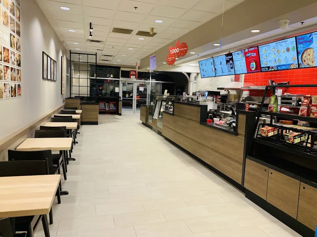 Tim Hortons storefront and interior at 2571 St Clair Ave West, Toronto, ON