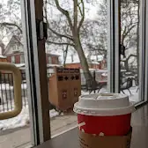 Tim Hortons storefront and interior at 3157 Dundas St W, Toronto, ON