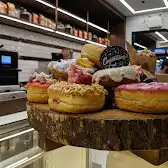 Tim Hortons storefront and interior at Food Court - 130 King St West, Toronto, ON