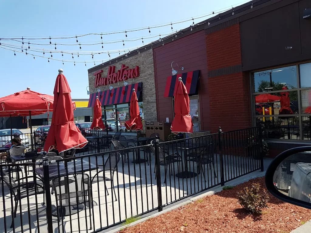 Tim Hortons storefront and interior at 655, Avenue Du Pont Nord Centre Alma, Alma, QC