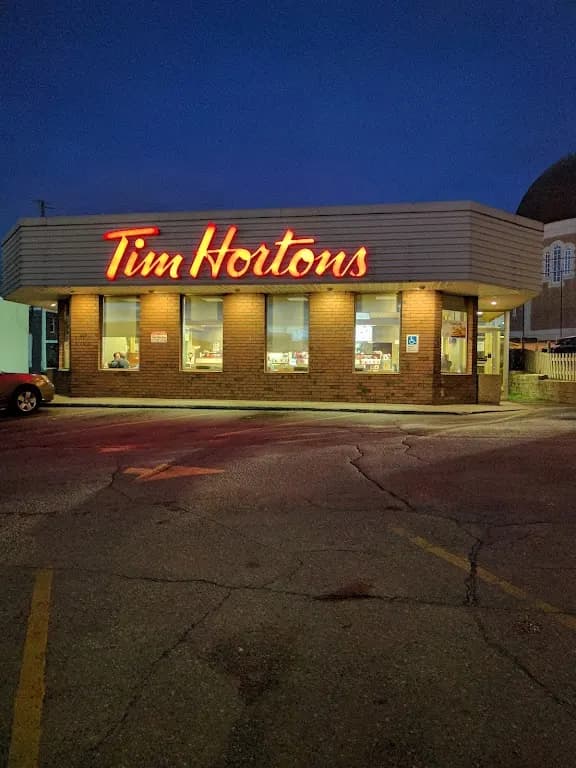 Tim Hortons storefront and interior at 31 Rue Principale Nord, Amos, QC