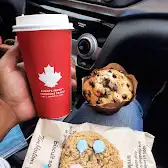 Tim Hortons storefront and interior at 1041 Av Gilles Villeneuve, Berthierville, QC