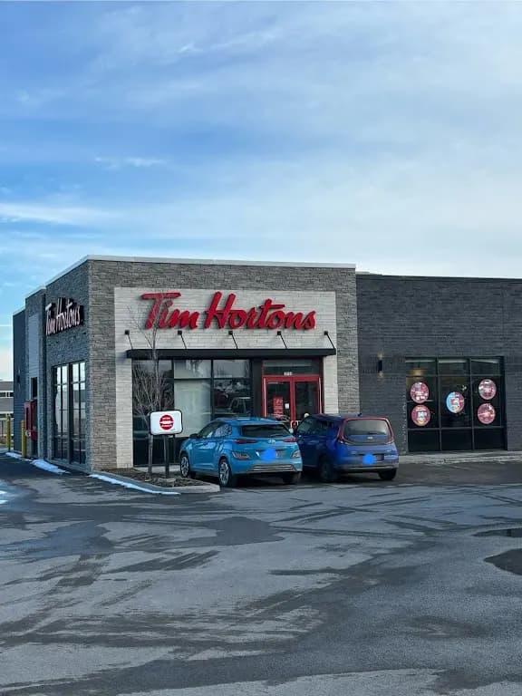 Tim Hortons storefront and interior at Chemin De La Cote-nord, Boisbriand, QC