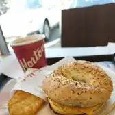 Tim Hortons storefront and interior at 7305, Boul. Grande-allee, Brossard, QC