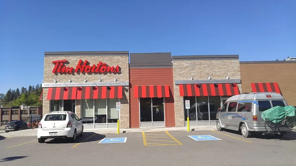 Tim Hortons storefront and interior at 2075 Tadoussac, Chicoutimi, QC