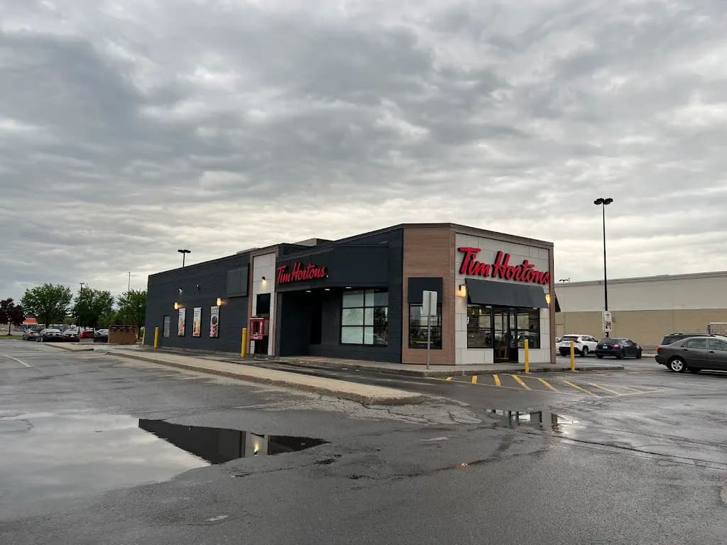 Tim Hortons storefront and interior at 760 Rue Desserte Ouest, Laval, QC