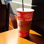 Tim Hortons storefront and interior at 1105 Av Du Phare Ouest, Matane, QC