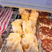 Tim Hortons storefront and interior at 1410 Route 201, Ormstown, QC