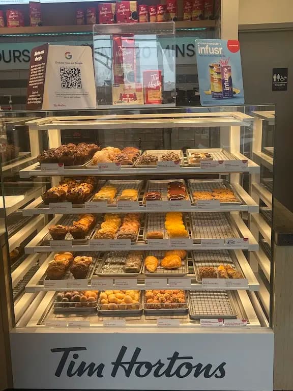 Tim Hortons storefront and interior at 457 Boul Lacombe, Repentigny, QC