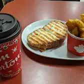 Tim Hortons storefront and interior at 7 Chemin Fairfax, Stanstead, QC