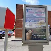 Tim Hortons storefront and interior at 22 Place Du Commerce, Verdun, QC