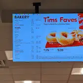 Tim Hortons storefront and interior at 10-3028 Meadows Parkway, Saskatoon, SK