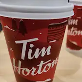 Tim Hortons storefront and interior at 709 Circle Dr East, Saskatoon, SK