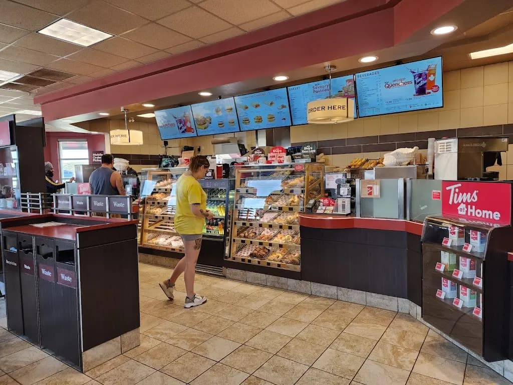 Tim Hortons storefront and interior at 3203 22nd St W, Saskatoon, SK
