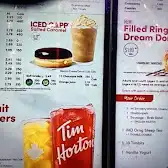 Tim Hortons storefront and interior at 3203 22nd St W, Saskatoon, SK