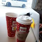 Tim Hortons storefront and interior at 3510 8th St E, Saskatoon, SK
